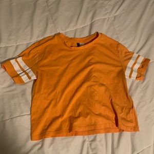 Golden yellow crop tee with white stripe sleeves